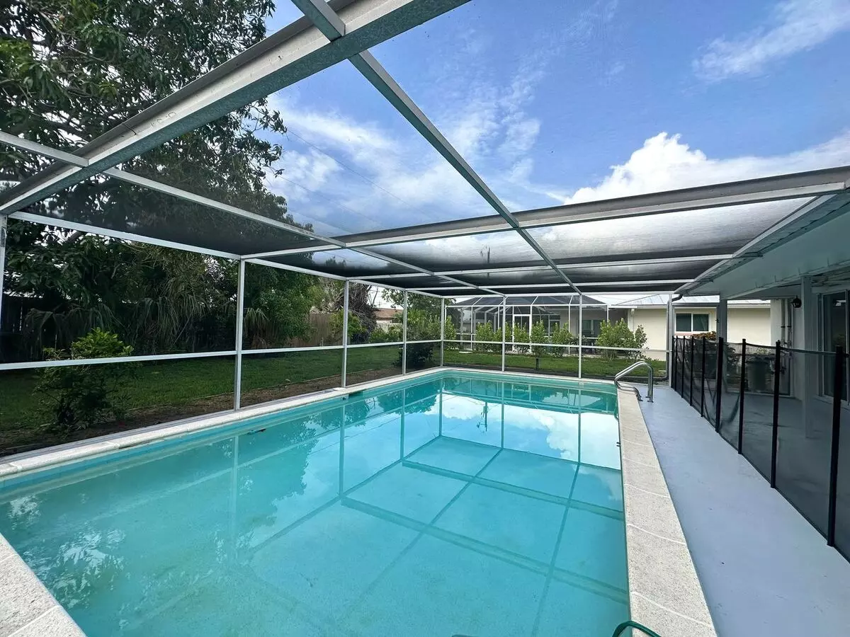 Charming 3 Bed, 2 Bath Pool Home In Se Cape Coral – Prime Location Near Beach & Bridge To Fort Myers! House for rent in Cape Coral, FL