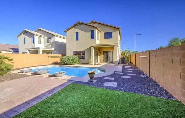 Luxurious 4 Bed, 2.5 Bath Pool Home In Desirable Festival Foothills Apartment for rent in Buckeye, AZ
