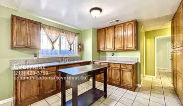 4 of 15 Charming 3-bedroom Home With Fenced Yard And Covered Parking / Pet-friendly / Vouchers Accepted / Available Soon! House for rent in Los Angeles, CA
