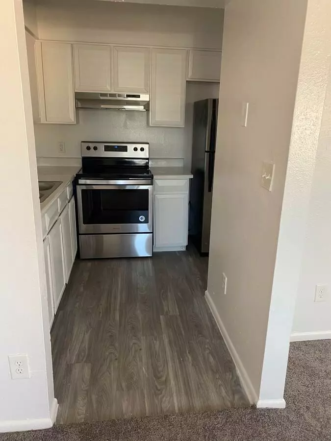 Apartment kitchen — representative home at Canyon Greens Apartments.
