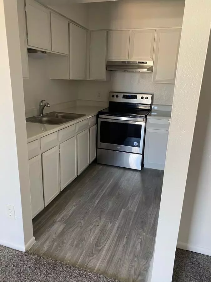 Apartment kitchen — representative home at Canyon Greens Apartments.