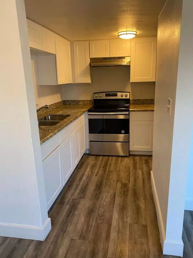 Apartment kitchen — representative home at Canyon Greens Apartments.