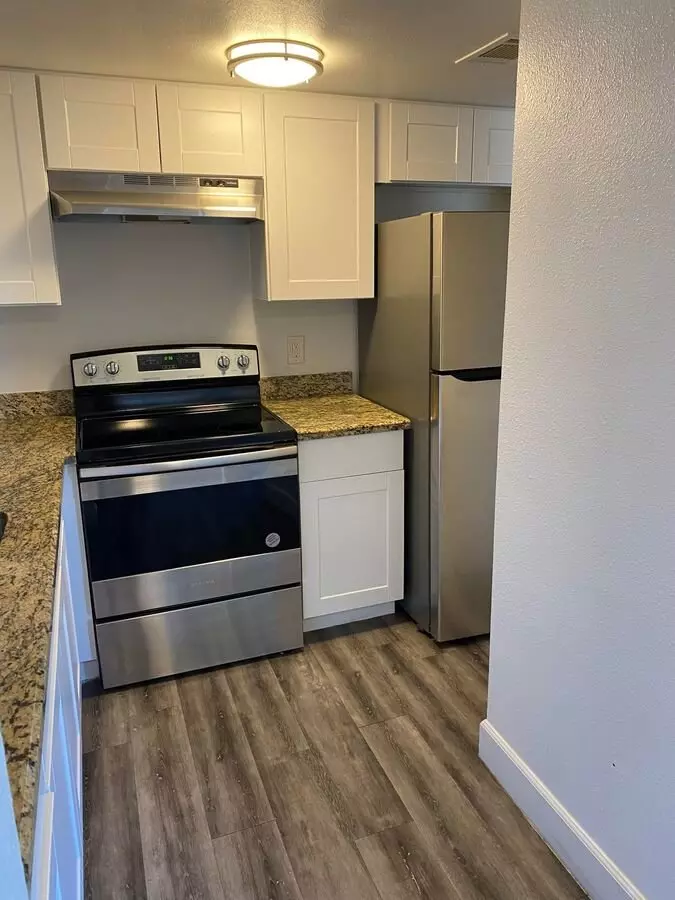Apartment kitchen — representative home at Canyon Greens Apartments.