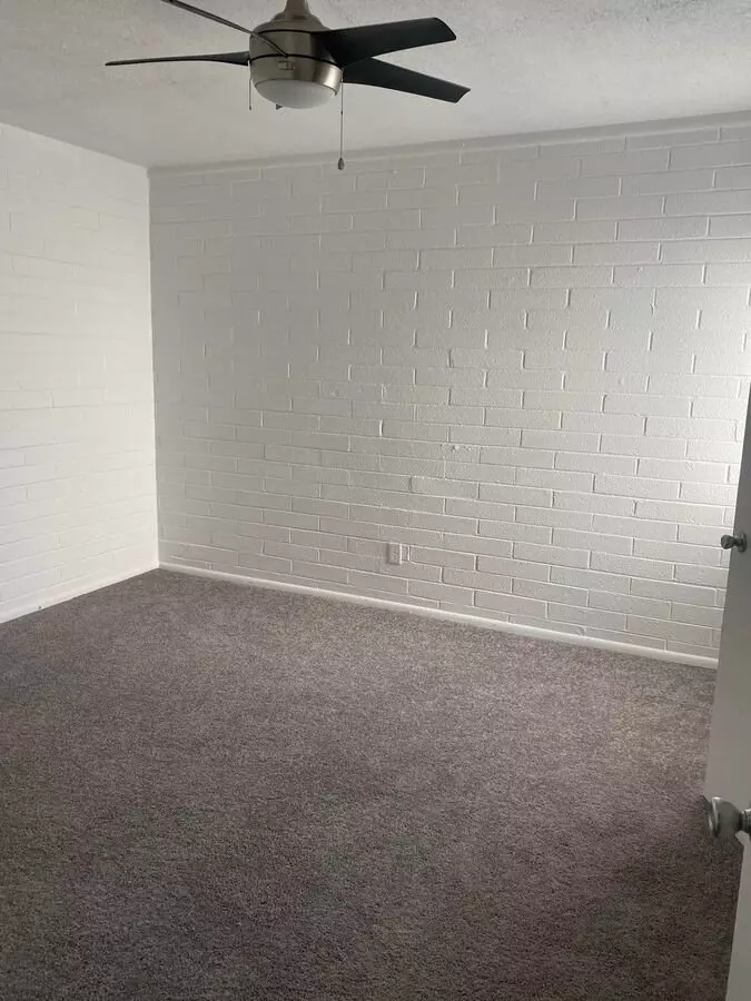 Unfurnished bedroom — representative home at Canyon Greens Apartments.