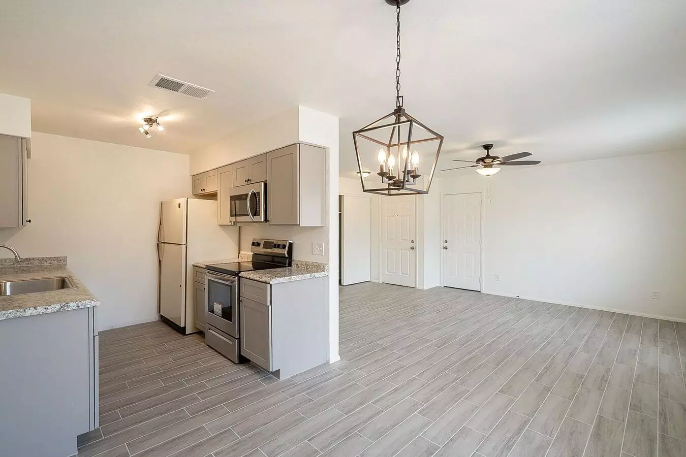 Updated Home With Large Backyard & 2 Car Garage! House for rent in Glendale, AZ
