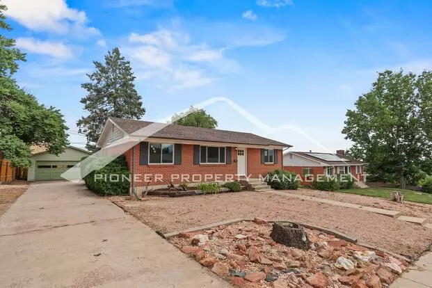 Spacious 4-bed, 2-bath Home With Finished Basement, Mountain Views & Oversized Garage Apartment for rent in Colorado Springs, CO