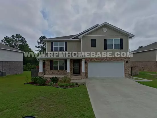 Spacious 5-bedroom Home With Flexible Living Spaces And Lush Garden Oasis Apartment for rent in Crestview, FL