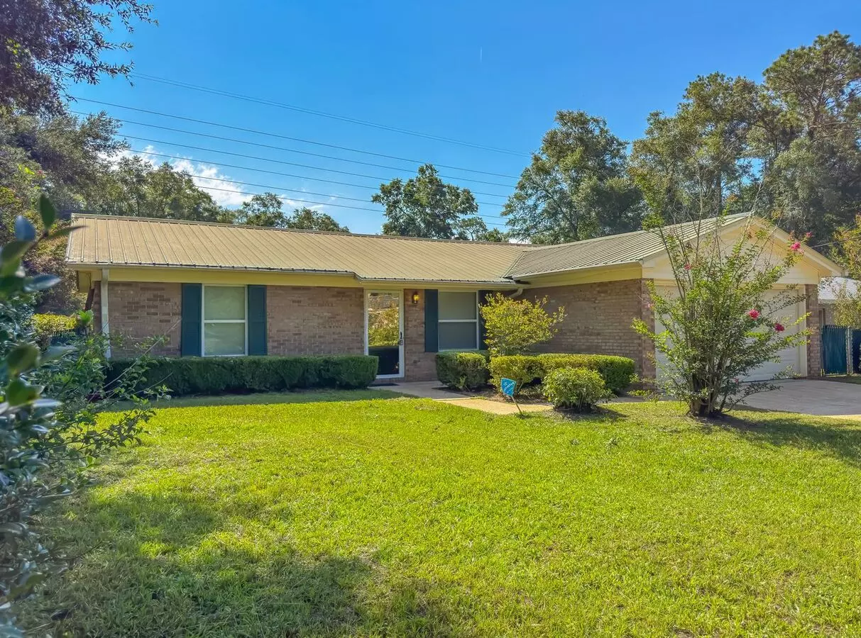 Updated 3/2 Nw House W/ 2-car Garage, Fenced Yard, New Paint And Flooring, & More! $1850/month Available Now! House for rent in Tallahassee, FL