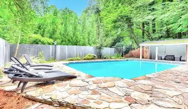2 of 51 Luxurious 5-bedroom Retreat With Pool, Hot Tub, And Spacious Backyard – Just Minutes From Atlanta’s Attractions! House for rent in East Point, GA