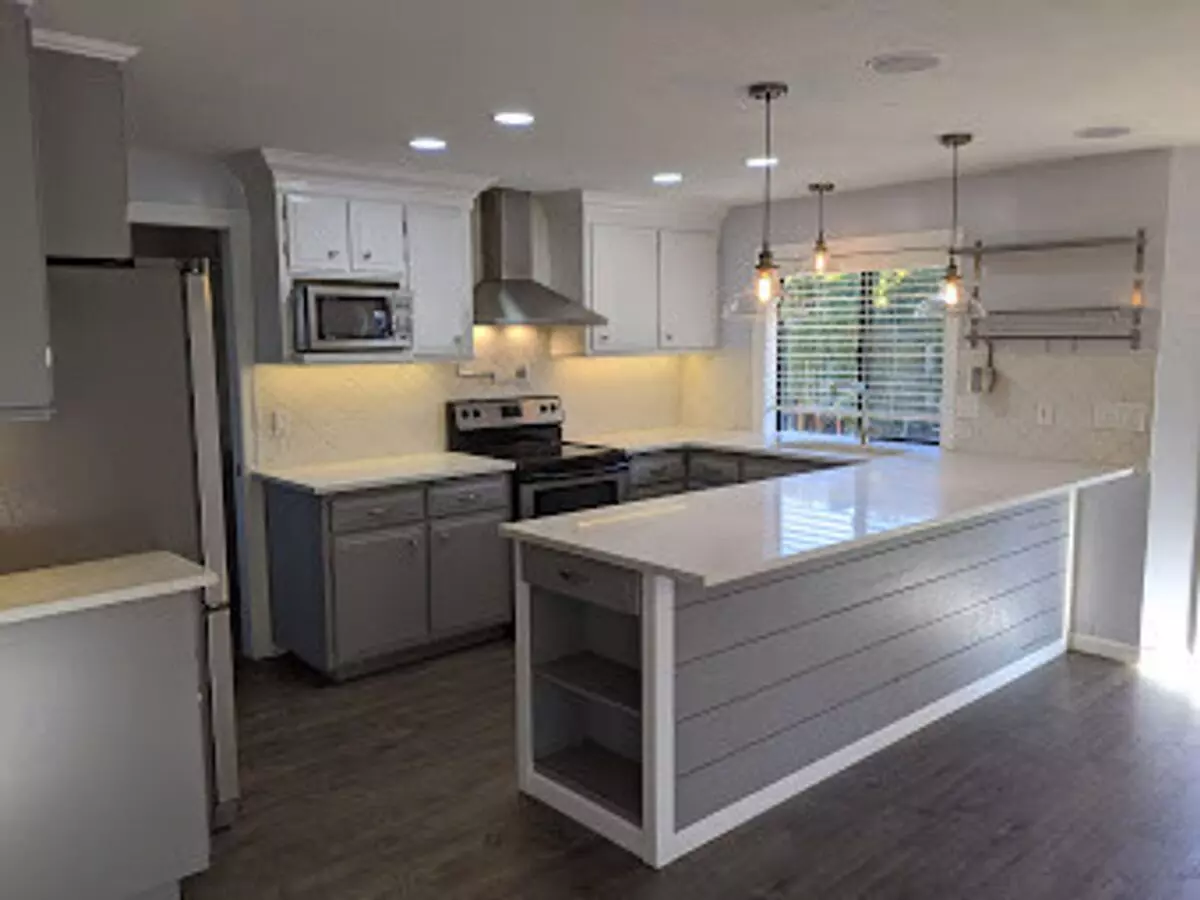 Updated 3-bedroom, 2.5-bath Home ~ Solid Surface Flooring And Spacious Kitchen! House for rent in Eugene, OR