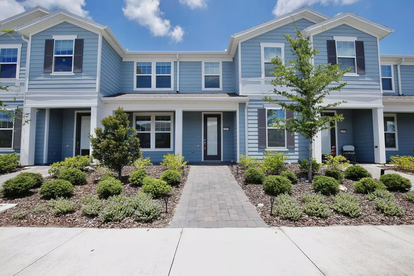 Beautiful 3/2.5 Modern Townhome With A Private Courtyard And A 2 Car Garage In The Gated Isles Of Lake Nona - Orlando! House for rent in Orlando, FL