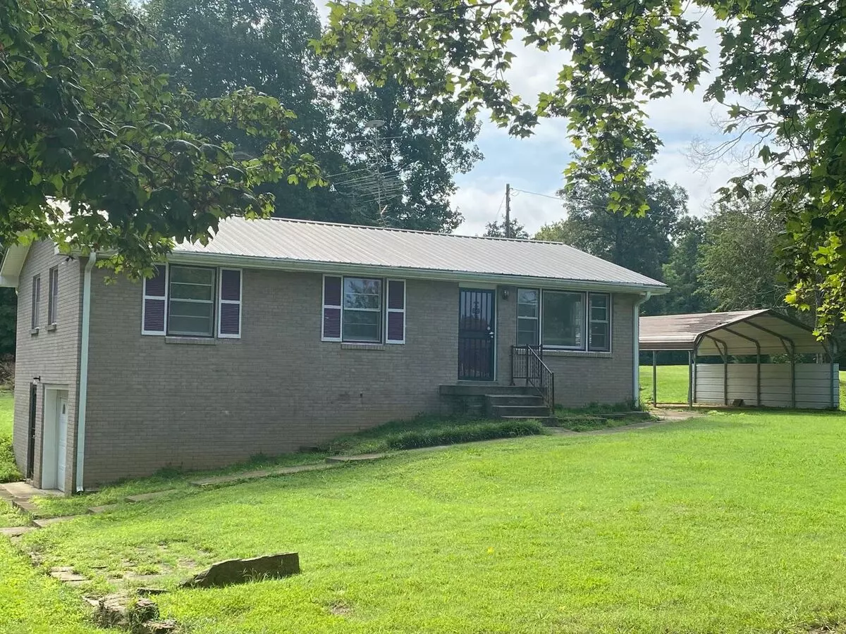 3 Acres In Sango! All Brick House With Unfinished Basement, 1 Car Garage And 2 Carports! House for rent in Adams, TN