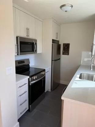 Special Offer $100 Rent Credit! New Modern Remodel 2 Bd 1.5 Bath Townhouse Private Patio, Gorgeous New Hardwood Floors, Stainless Steel Appliances D/w Microwave, Quartz Counters, Subway Tile Bathroom, Multiple Closet Spaces, Pet Friendly, Private Parking Apartment for rent in Portland, OR