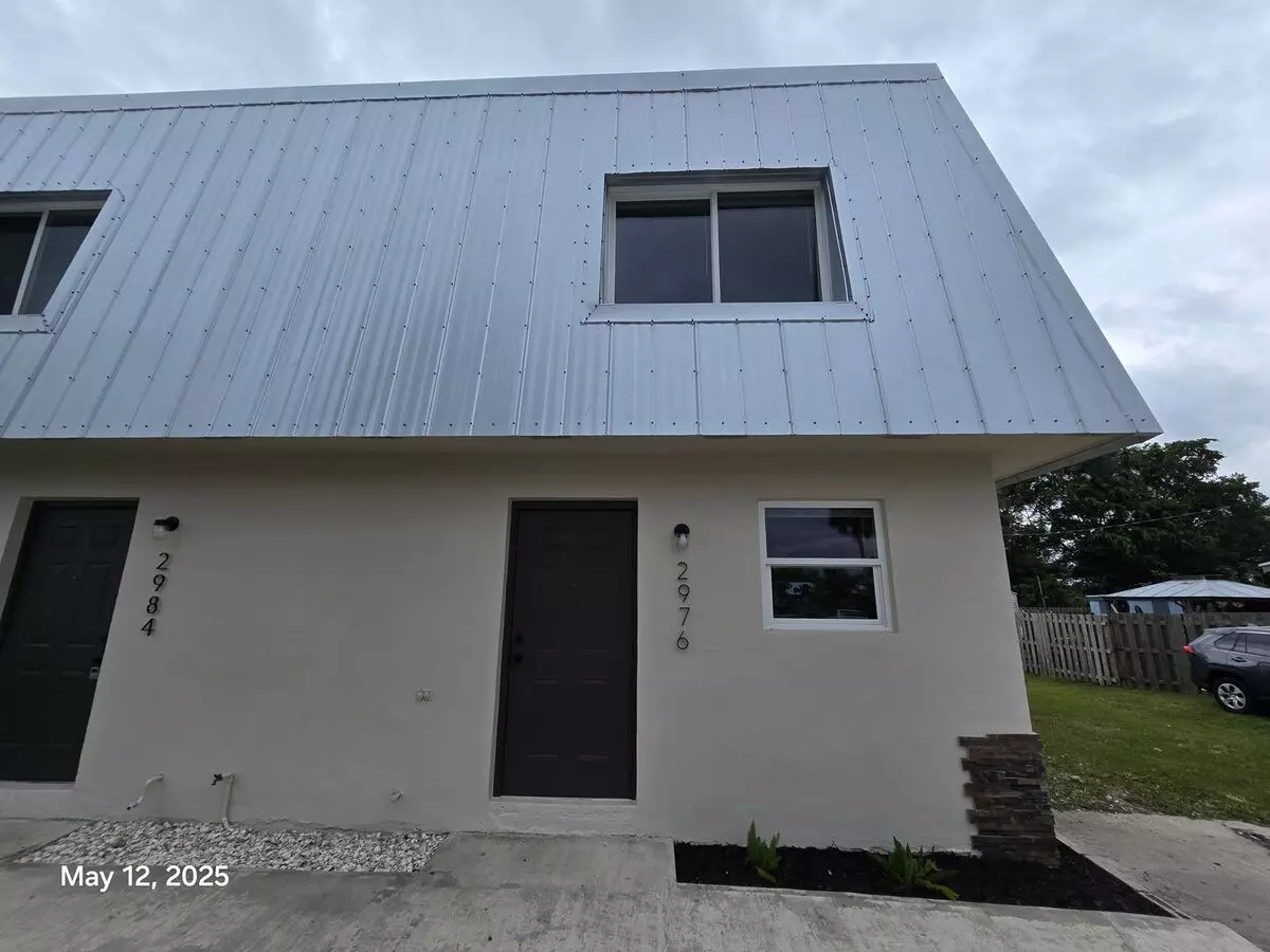 This Renovated Home Provides Modern Convenience With A Durable Metal Roof, Impact-resistant Windows, And Brand-new Carpeting Throughout. House for rent in Stuart, FL