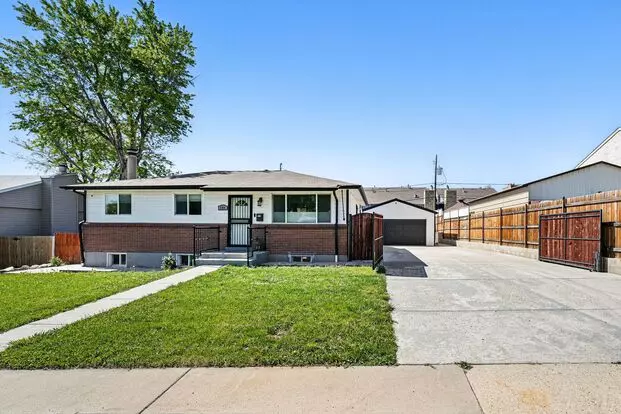 Updated 4-bedroom Home With Large Backyard And 2-car Garage Apartment for rent in Denver, CO