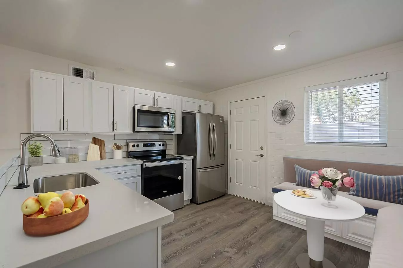 Virtually staged kitchen at Rovey Apartments.