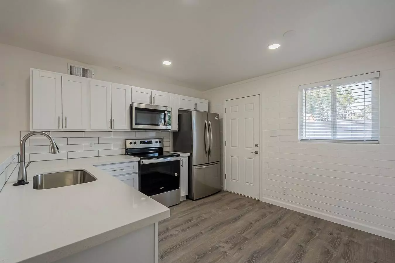 Apartment kitchen — representative home at Rovey Apartments.