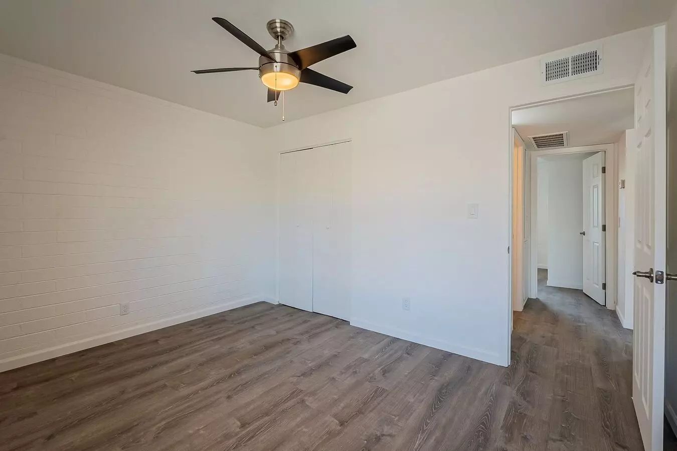 Unfurnished bedroom — representative home at Rovey Apartments.