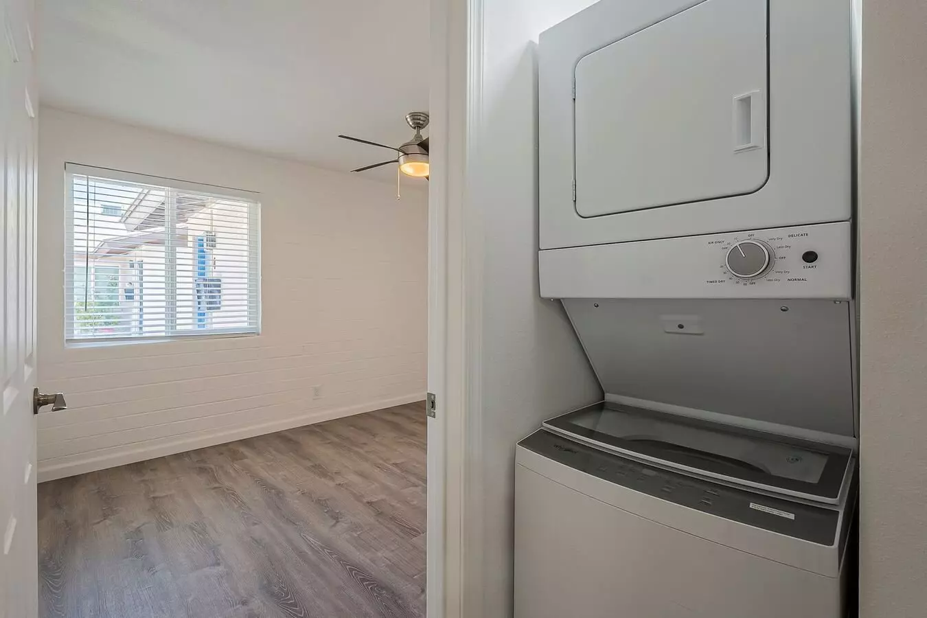 In-home laundry area — representative home at Rovey Apartments.