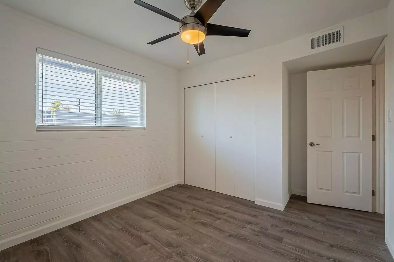Unfurnished bedroom — representative home at Rovey Apartments.