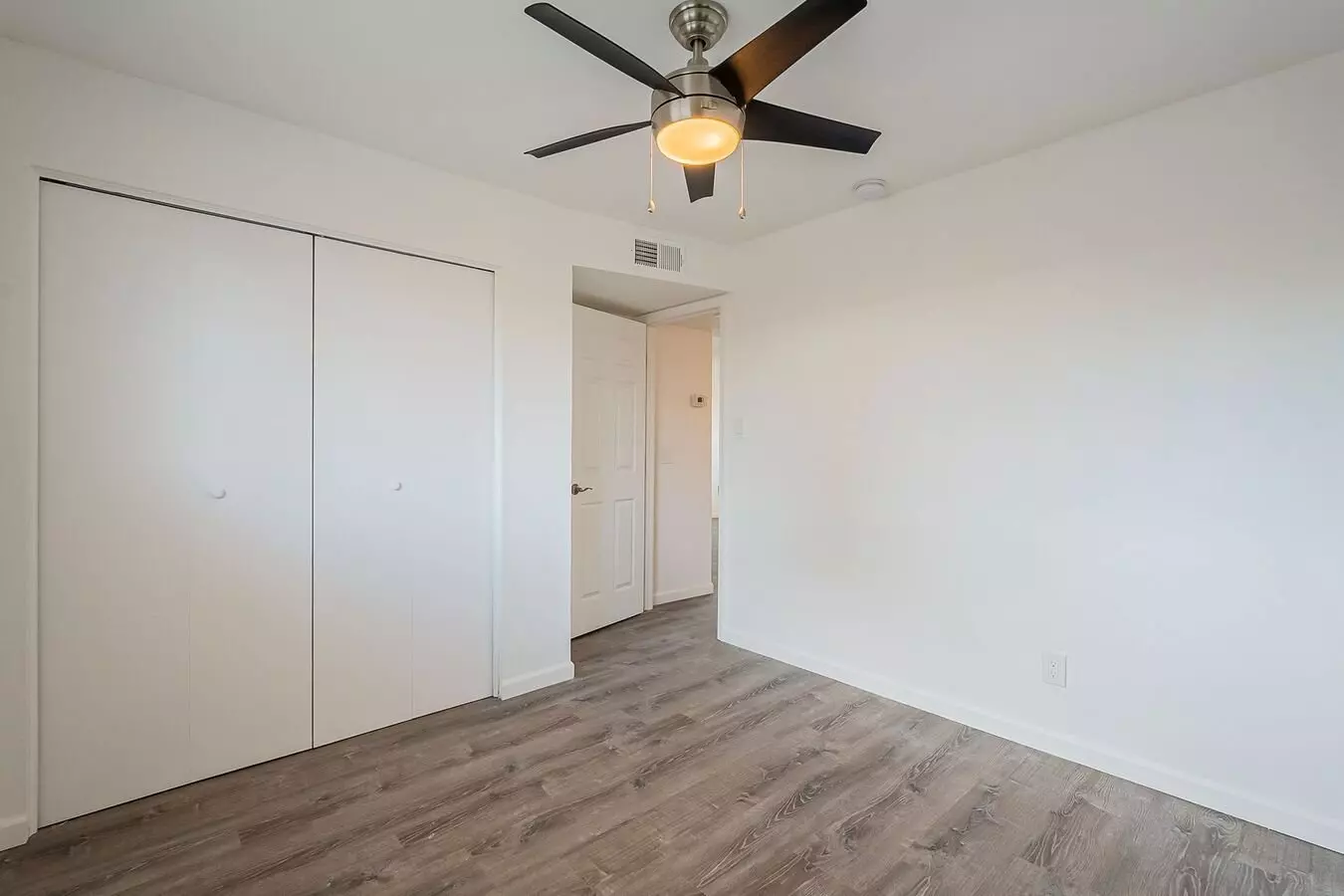 Unfurnished bedroom — representative home at Rovey Apartments.