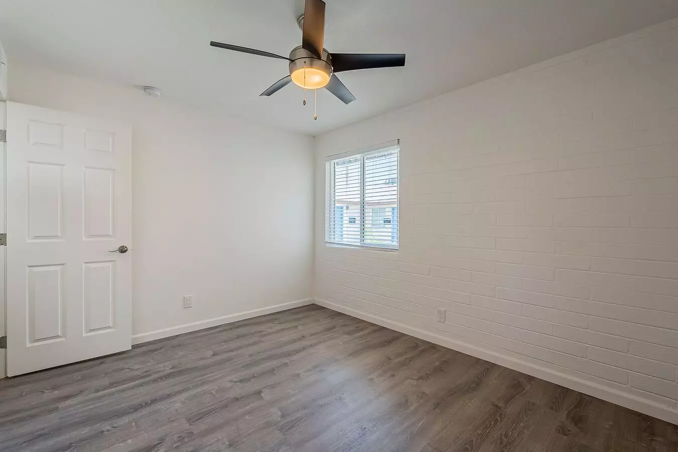 Unfurnished bedroom — representative home at Rovey Apartments.