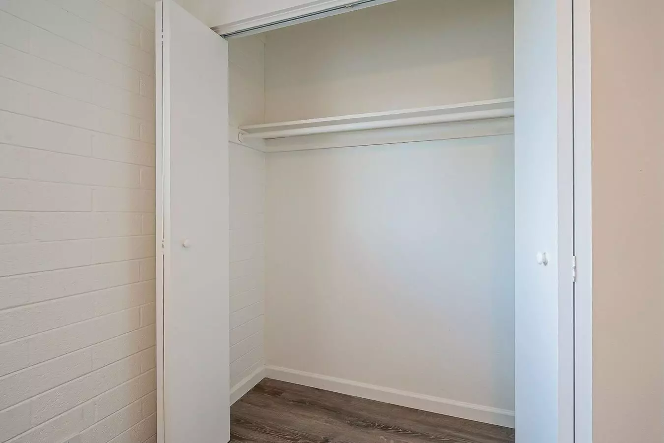 Closet storage — representative home at Rovey Apartments.