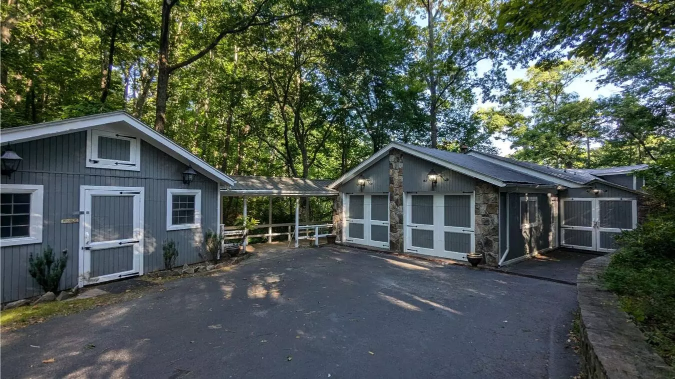 Unique Lake Lanier Front Home W/spectacular Natural Rock Waterfall And Dock House for rent in Gainesville, GA