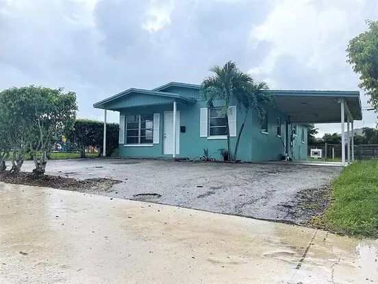 Cute 3 Bedroom House With Carport Apartment for rent in Riviera Beach, FL