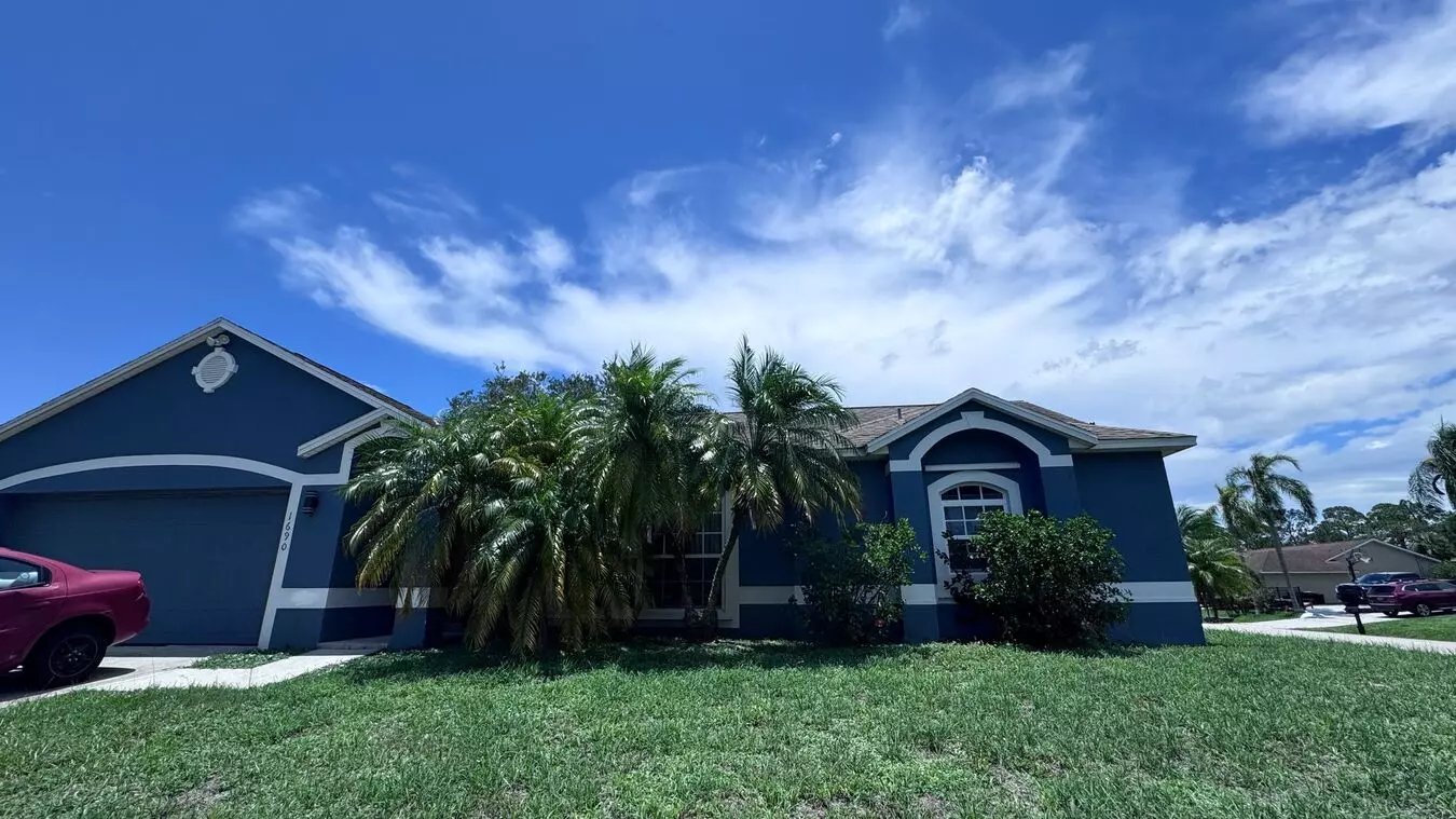 Spacious 4-bedroom Home In Nw Palm Bay – All Tile, Fenced Partial Backyard! House for rent in Palm Bay, FL