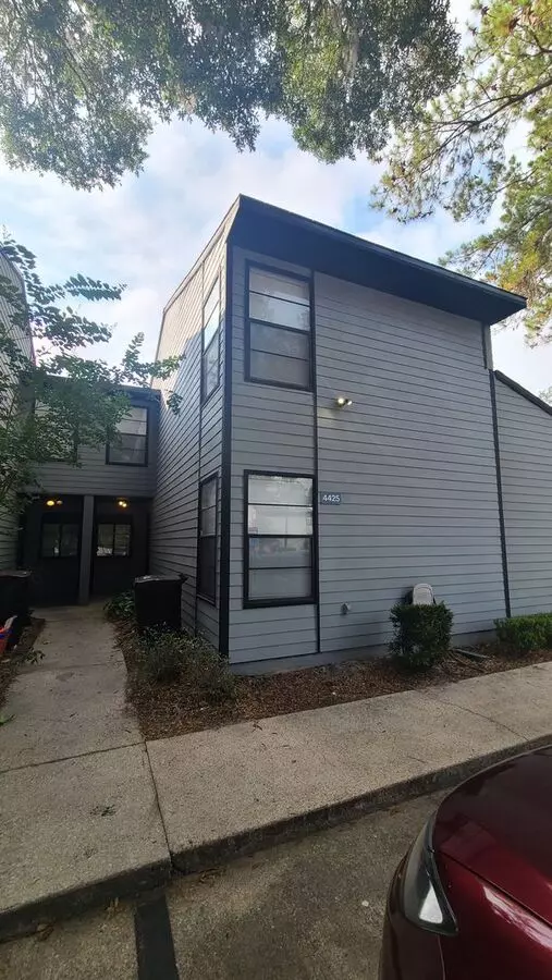 Spacious 3/2 With Fenced In Back Patio By The Pool House for rent in Gainesville, FL