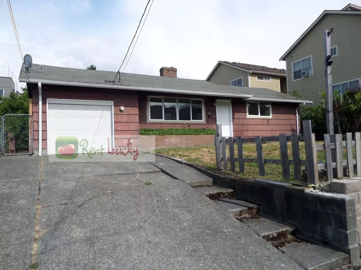 Super-cute 2-bedroom Home W/attached Garage And Large Yard In Great Seattle Location!! House for rent in Seattle, WA