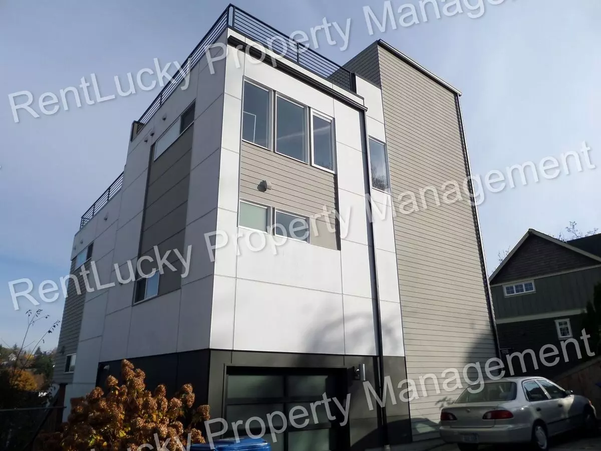 Fantastic 3 Bedroom Townhome W/attached Garage And A/c In Seattle!! House for rent in Seattle, WA