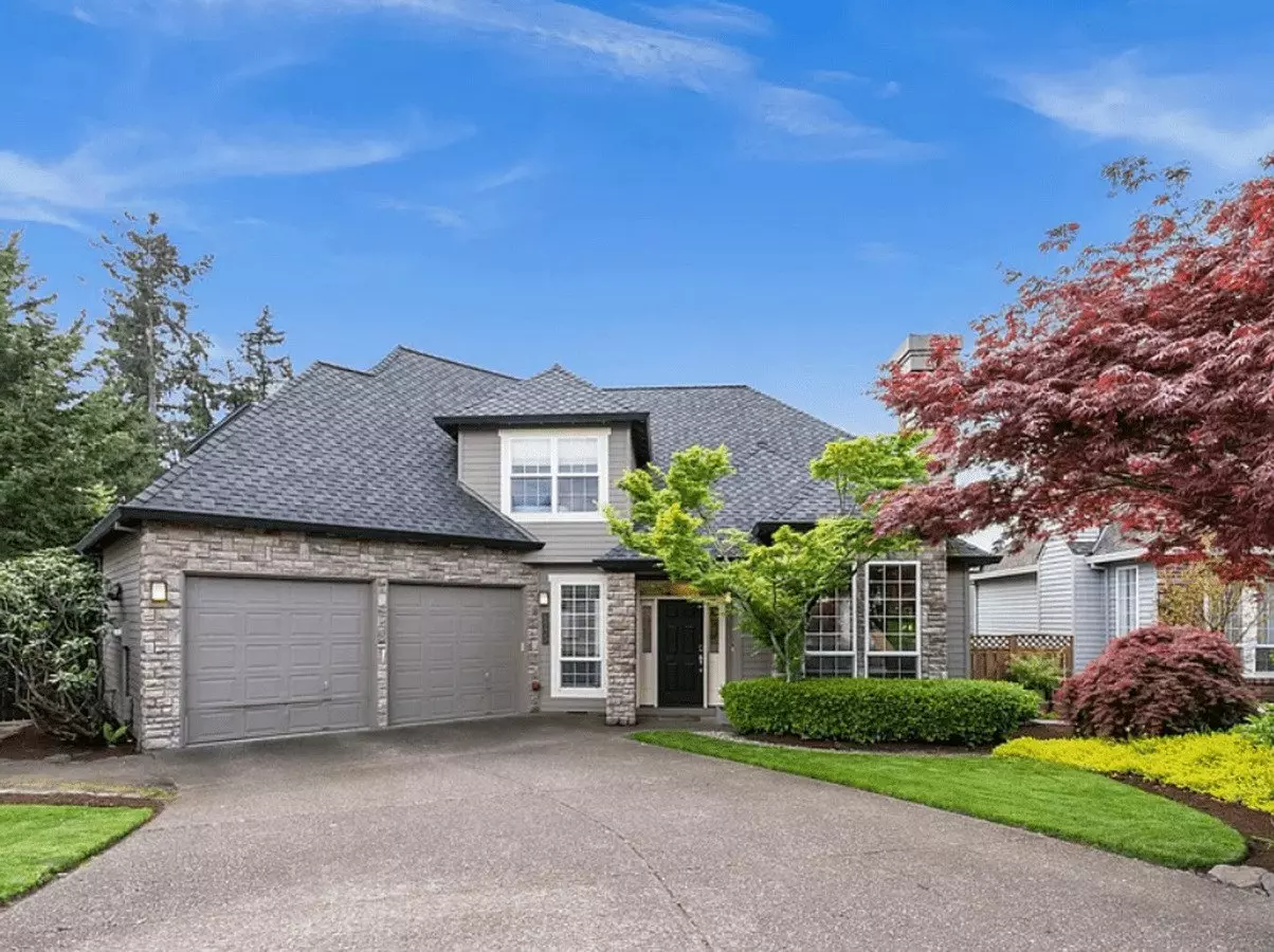 Spacious 4-bedroom Home With Chef’s Kitchen, Dual Decks, Central A/c & Prime Cedar Mill Location House for rent in Portland, OR