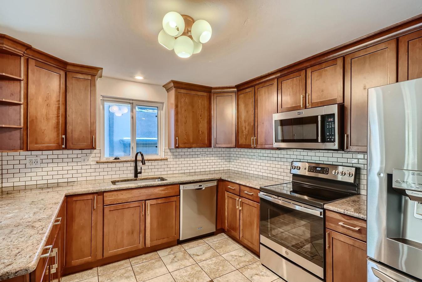 Updated Sunnyside gem with grassy fenced yard &... Apartments Denver, CO